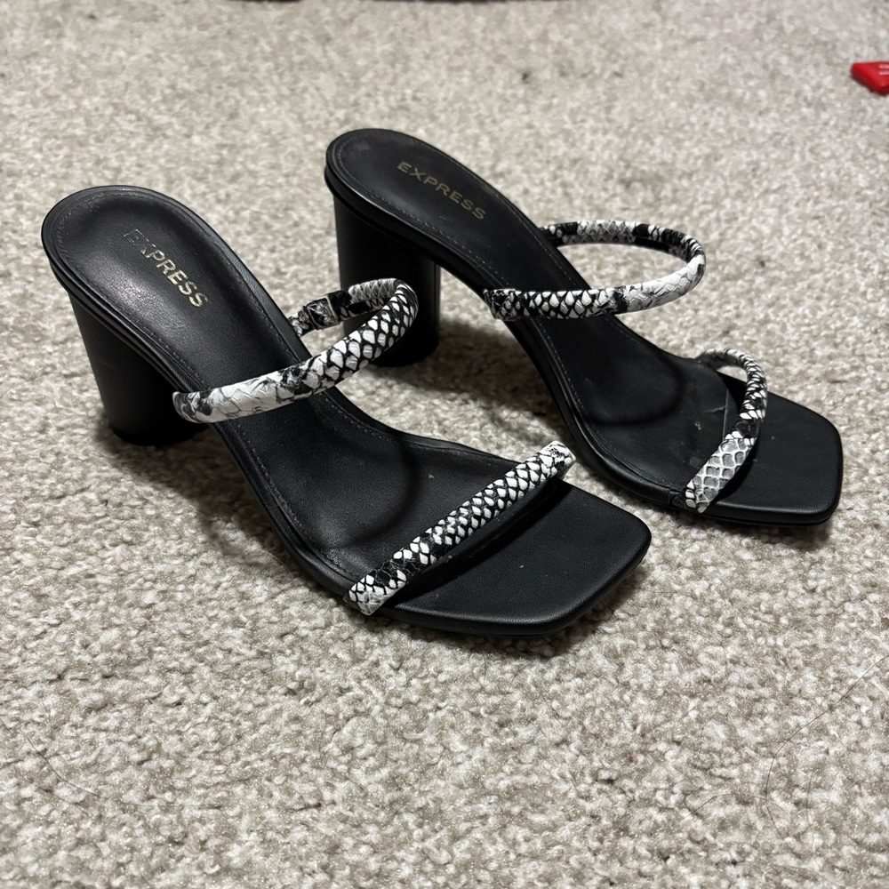Express snakeskin/black heels